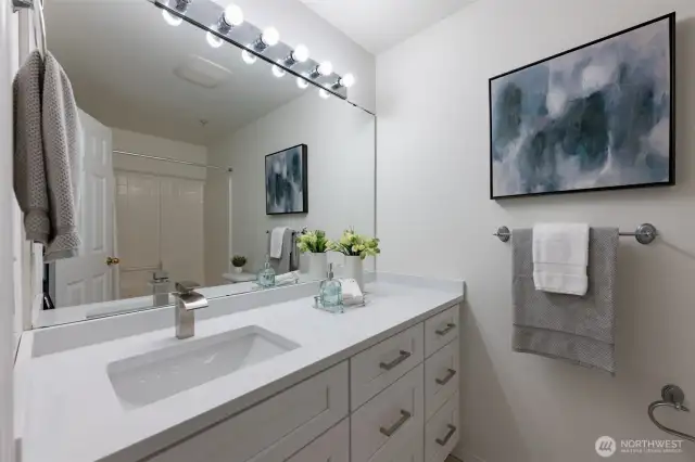 Remodeled primary bathroom. New paint, counter tops and vanity.