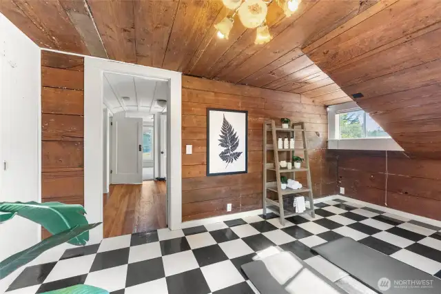 Bright upstairs bedroom #5 with natural light and flexible layout, offering endless possibilities for use as a guest room, home gym, or creative space.