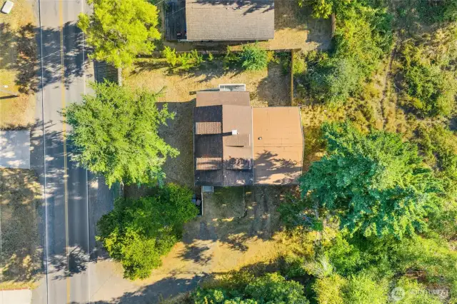 Surrounded by mature trees, this home offers a private, secluded feel while still being just minutes from shops, dining, and the waterfront—your perfect daily retreat.