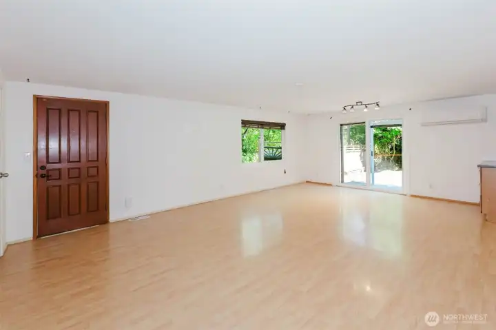 Living room with slider out to backyard