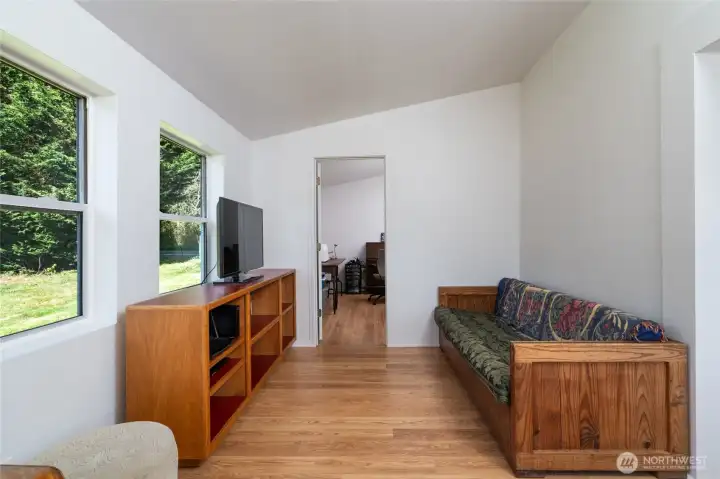 Living room with laminate flooring.