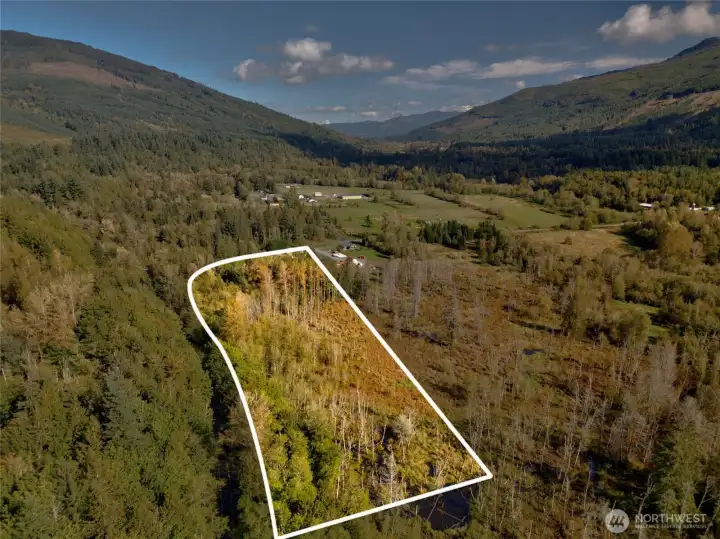 Approximate outline of property lines, totaling 10.7 acres.