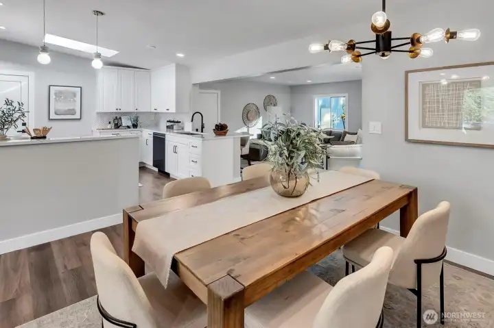 Dining area next to the kitchen for easy access. Kitchen open to the dining area