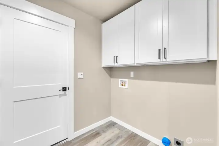 Laundry room going to the garage