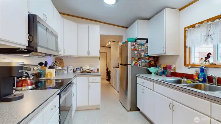 The kitchen with stainless steel appliances!