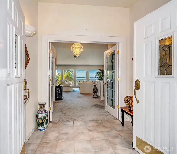 Tiled Flooring Entry W/ Double Doors.