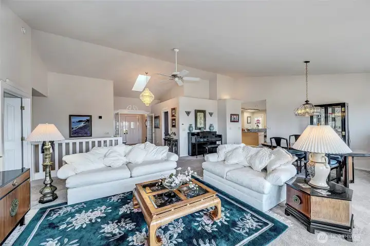 Another View From Living Area Showing Entry, Skylight, Kitchen Entrance & Painted Mill Work Everywhere.
