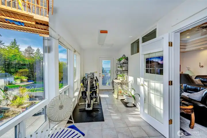 Sunroom Off The Kitchen & Family Room Area.