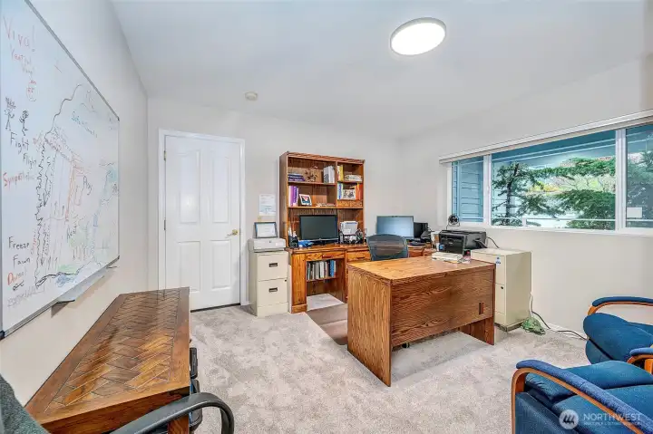 2nd Bedroom Upstairs w/ Door To Garage & Master Bathroom.