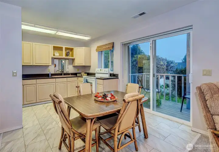 Downstairs Kitchen w/Eating Area. Slider To Another View Deck And Gorgeous Backyard.