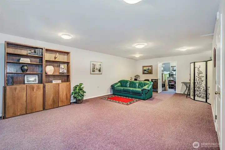 Extra Large Bonus Rooms Downstairs. Good Sized Storage Area That Leads To The Other 2 Car Garage.