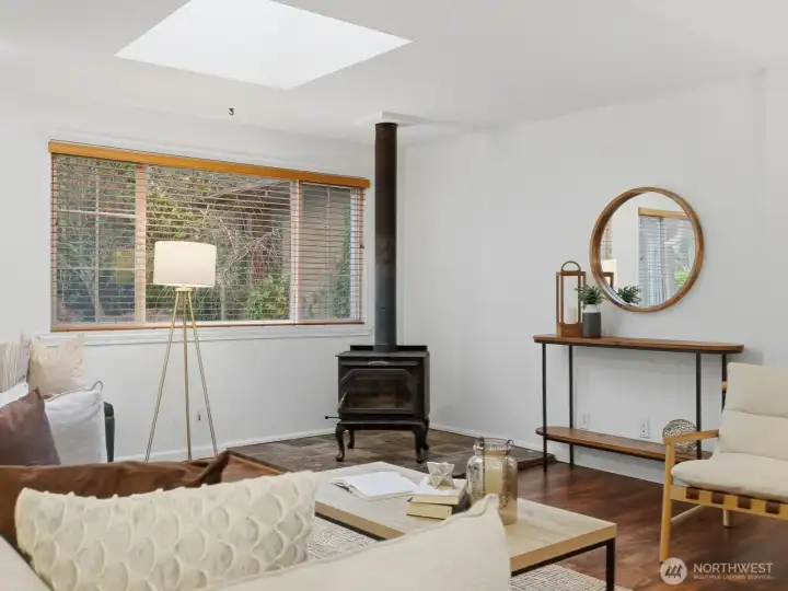 Charming wood burning stove keeps cozy vibes in the living room