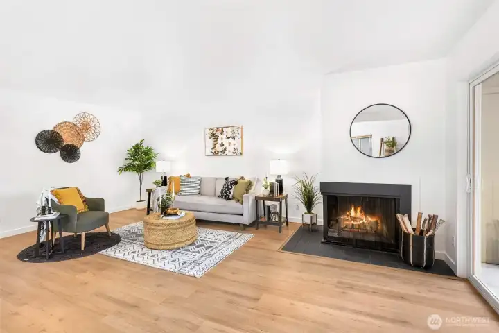 Wood burning fireplace in the main living space, perfect for entertaining.