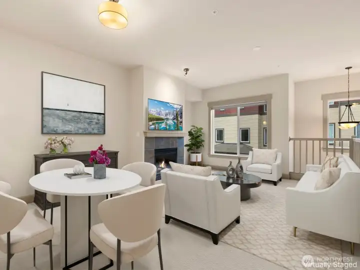 Virtually staged Dining and Living room with gas fireplace