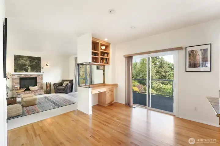 The sitting room is open to the kitchen with access to the expansive deck.  Making this home perfect for entertaining.