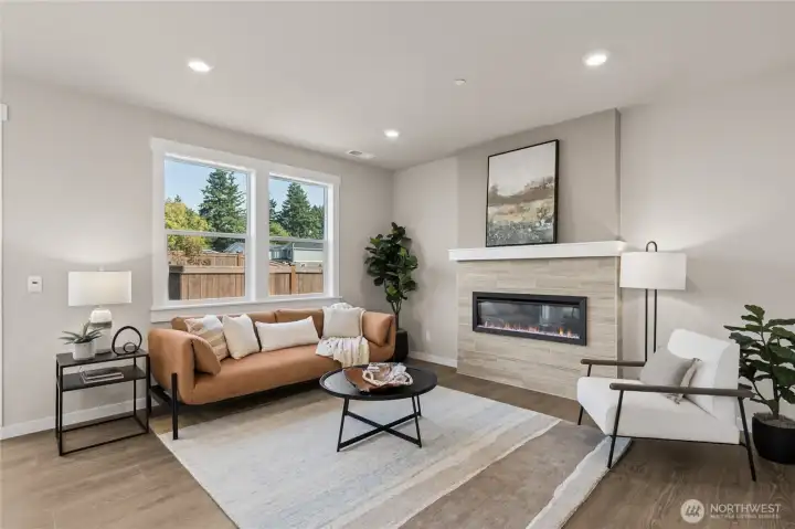 Photo showing a staged home within the community on a different homesite.  This home will have a much larger back yard!