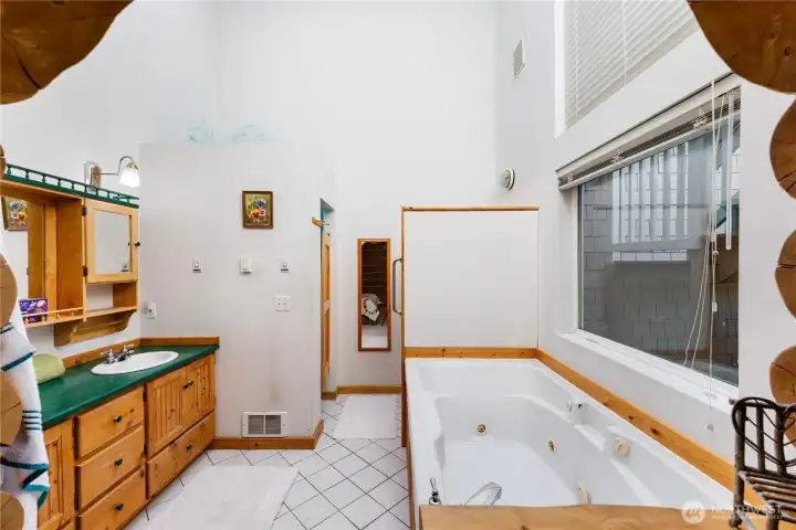 Primary Bathroom with Shower and Jetted Tub