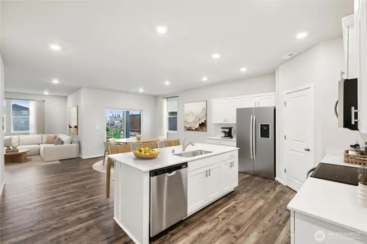 Cali plan virtually staged. Cabinet color may vary.