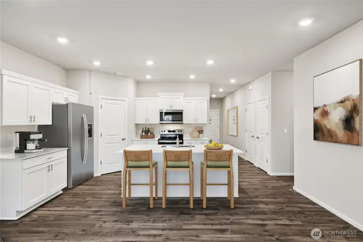 Cali plan virtually staged. Cabinet color may vary.