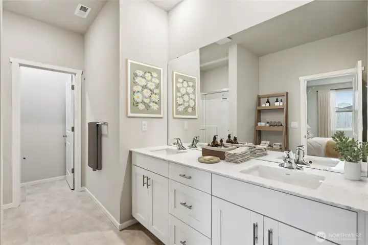 Cali plan virtually staged. Cabinet color may vary.