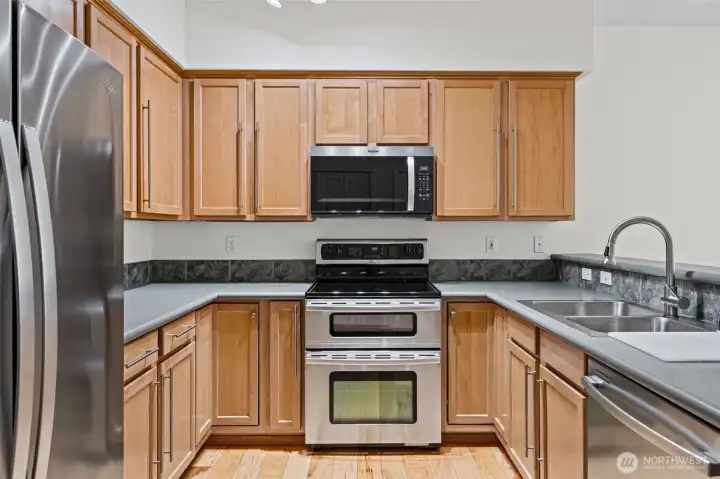 Large kitchen with new refrigerate and microwave