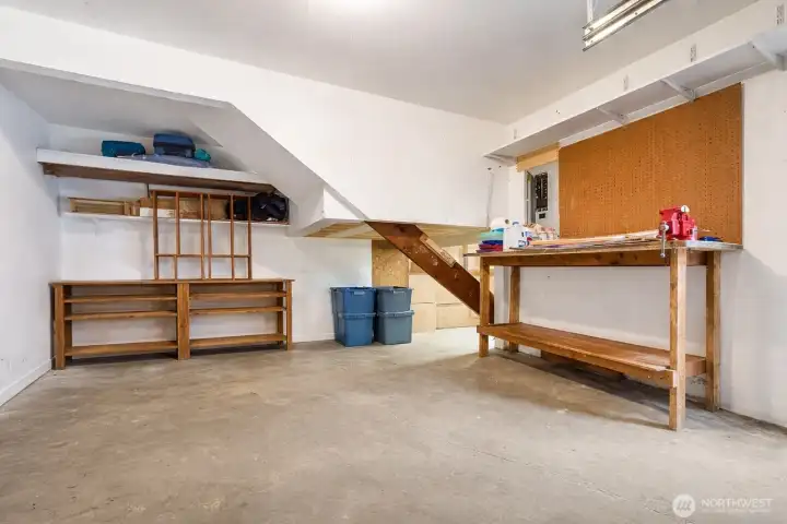 Single Car Garage with a Storage Room at the back. New garage door. Single Car Garage with a Storage Room at the back. New garage door.