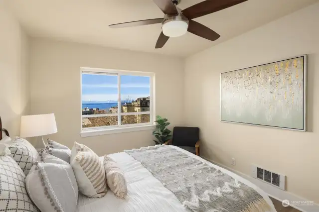 Generous size room with a modern ceiling fan for comfortable temps year round.