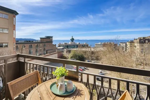 Enjoy stunning views from your deck!  The iconic PI globe, the Cascade Mountains and the Puget Sound out to Bainbridge Island all right there!