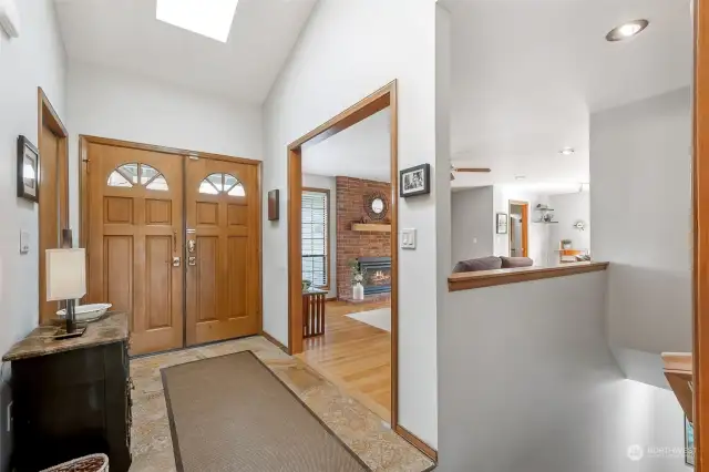 Large foyer & beautiful light fixture welcome you to this cheerful home!