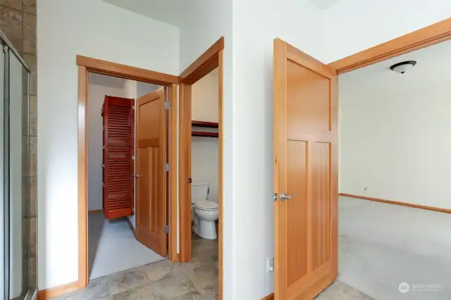 main bathroom with one of two closets
