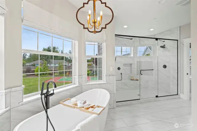 Large soaking tub with a huge 2person shower.