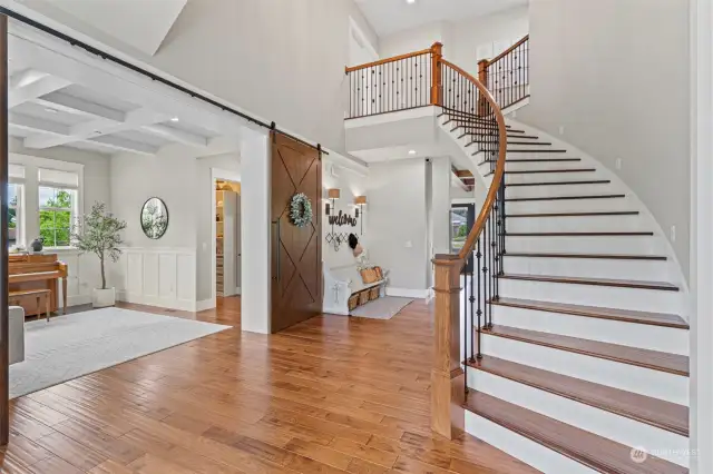 Beautiful grand entry with formal living on the right, and office to the left.