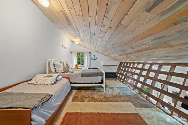 Loft bedroom overlooking great room below.