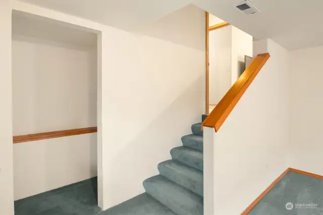 Heading down the final flight of stairs you'll find the 5th bedroom or movie theater room.