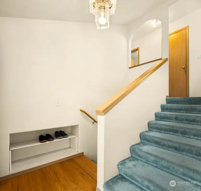 Place shoes in the built-in shoe shelving.