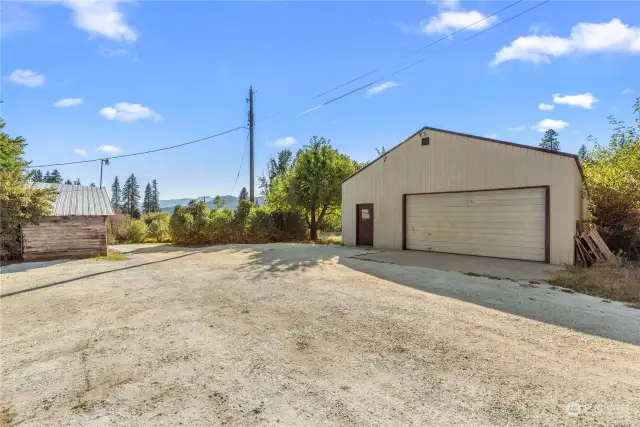 Plenty of parking and turnaround space, as well 1800 sq foot garage, complete with EV charging.