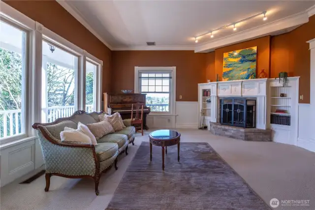 Living room with wood burning fireplace