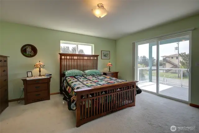 At the far end of the hallway of the second floor, with privacy away from the other bedrooms, you will find the primary suite.