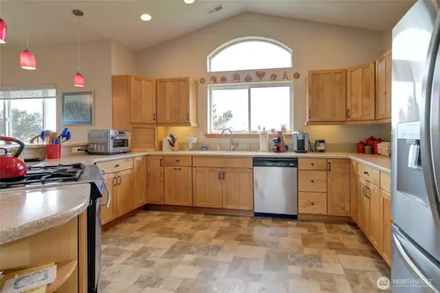 The kitchen has wonderful storage space, and an ocean view!
