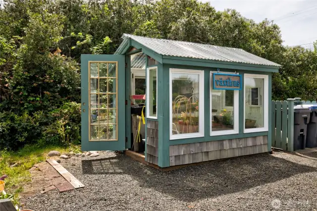 Heading back to ground level to explore more of the exterior, you will find a wonderful greenhouse to help you with your gardening!