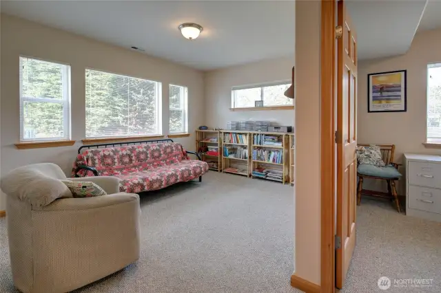 Adjacent to the family room, is another room that is for den/office space.