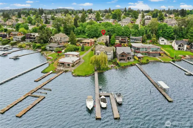 No need for a vacation when everything you love is right here! This spacious home has a permanent easement to the dock, so bring your boat, jet ski and paddleboard. Start making plans for the best summer ever! Home is highlighted with a red marker.