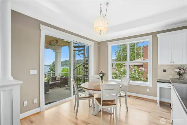 The nook is a perfect place to eat while taking in the great views. The sliding patio door leads to a covered deck with heater and gas fireplace making year-round al fresco dining possible.