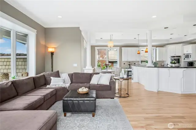 Another view of the great room, kitchen and nook on the main level, showing off the open floor plan.