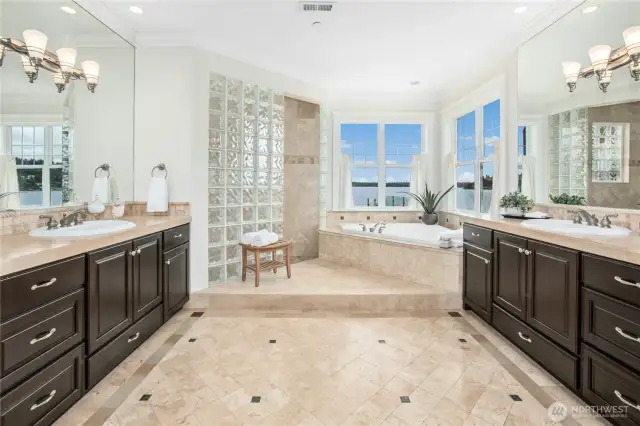 The primary suite has a luxurious five-piece bath you simply must see to believe!