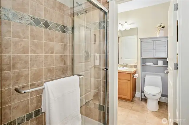 3/4 tile bath on the lower level, accessed via the bedroom or hallway.