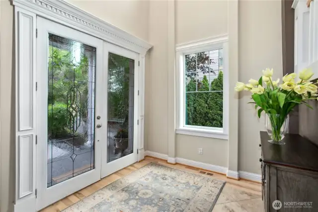 Once inside the leaded glass doors you will notice the refinished solid hardwood floors, sparkling new windows (South side windows replaced), tall ceilings and abundant custom molding and trim.