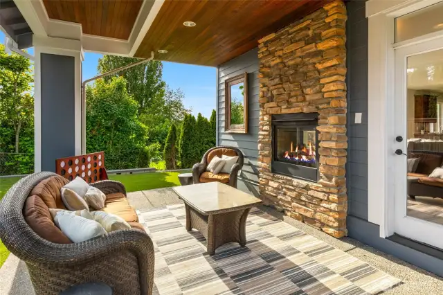 Covered patio with gas fireplace. Great hangout space!