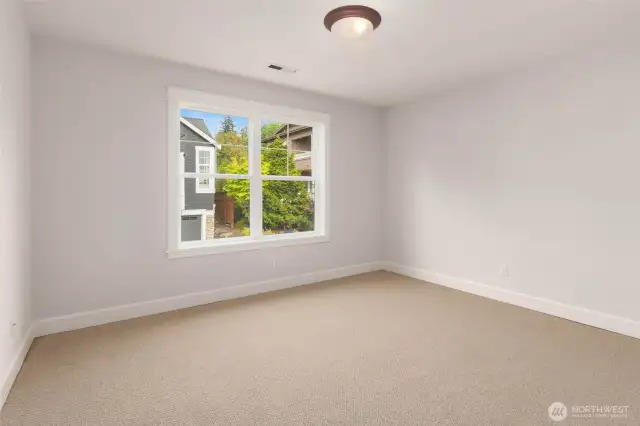 Ensuite bedroom on upper level.
