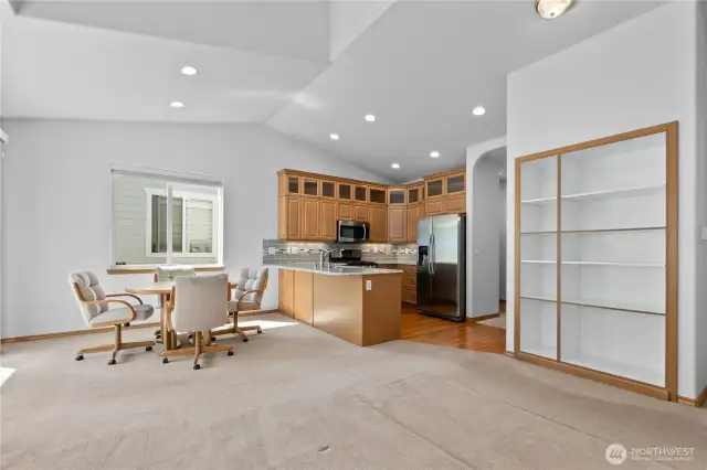 Bonus space above garage has custom cabinet doors that overlay this built-in